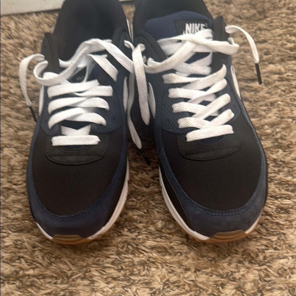 Nike Black and Blue Athletic Shoes with Swoosh Logo